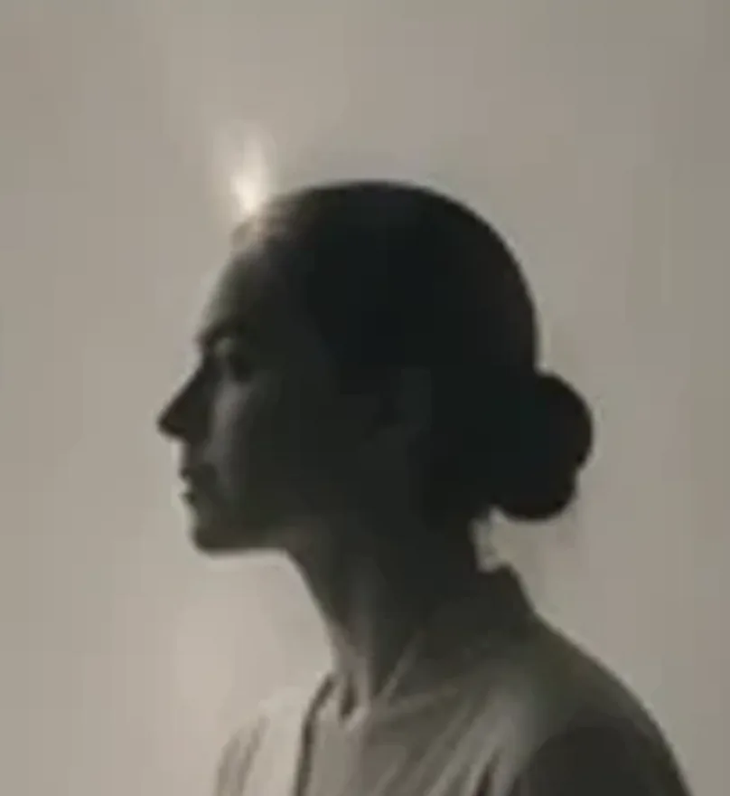 Profile portrait of a woman in soft light — cover of the women's health white paper