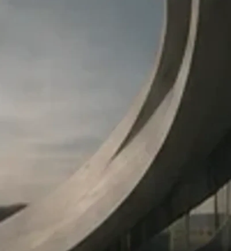 Sweeping curved modern architecture — cover of the healthcare infrastructure report